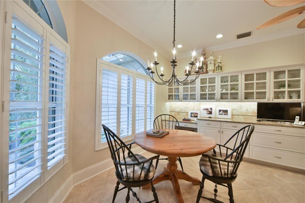 Breakfast Nook with Custom Wrought Iron Chandelier with 10 Candelabras