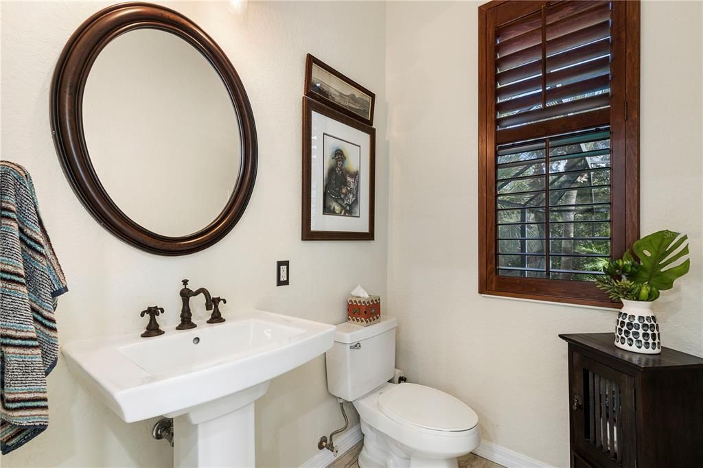 Powder room off kitchen.