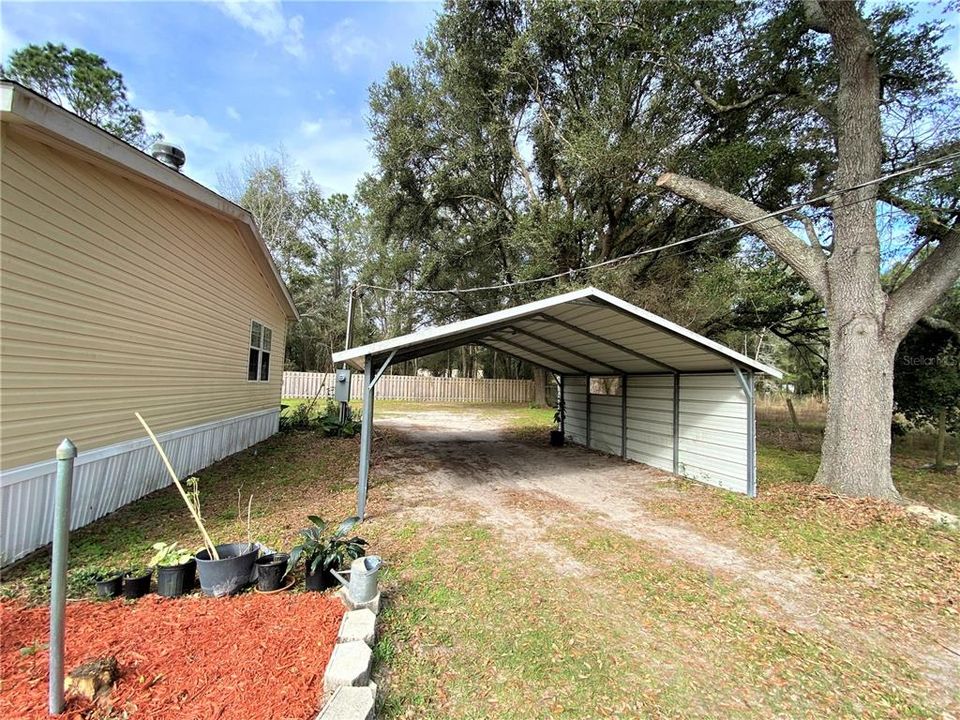 Additional carport for parking vehicles