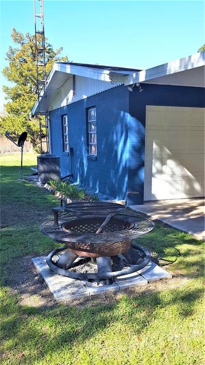 Fire Pit on South Side of Home