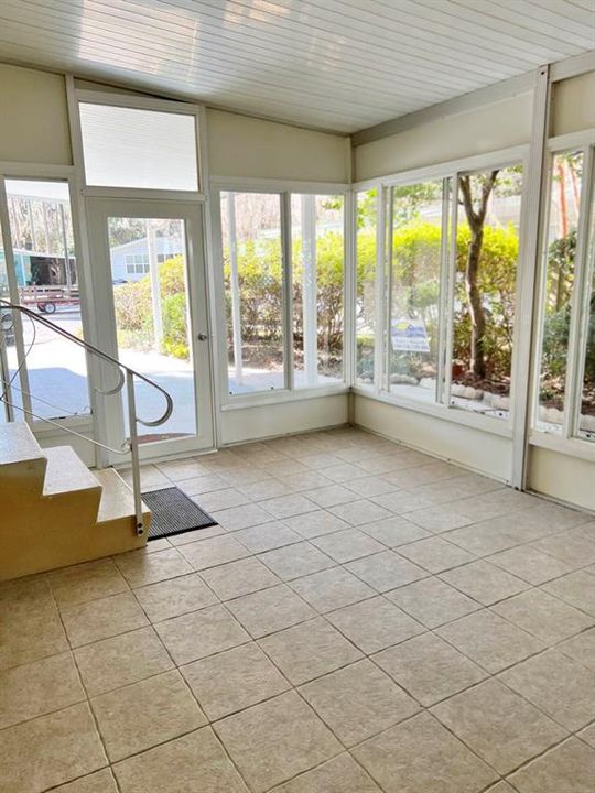 Florida Sun Room with sliding windows and screens