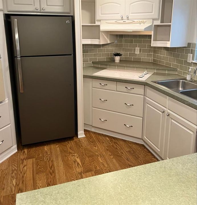 Kitchen with newer Refrigerator