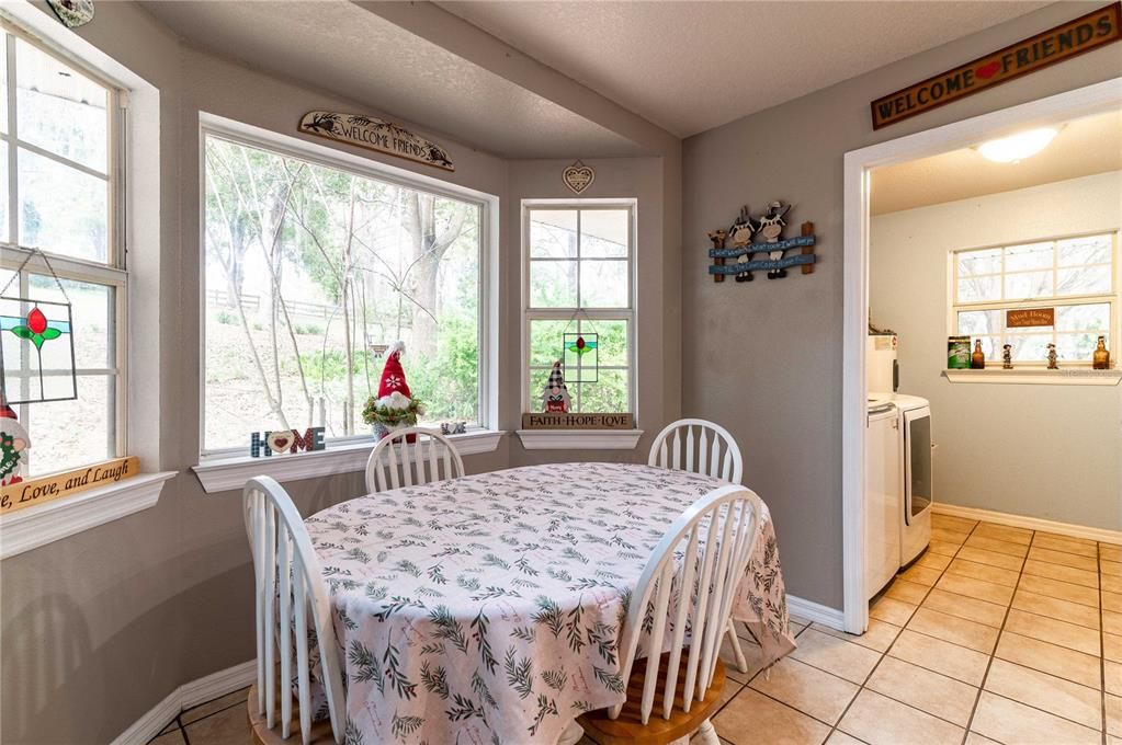 Breakfast nook area with bay windows