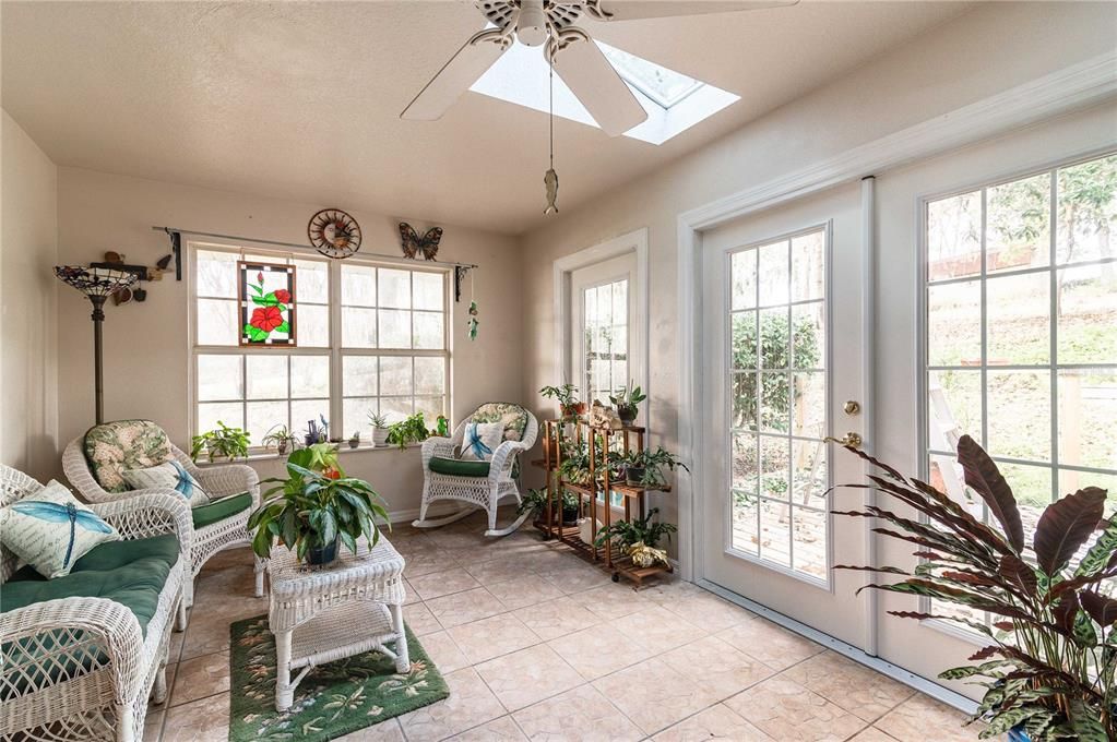 Sunroom leading to outside deck