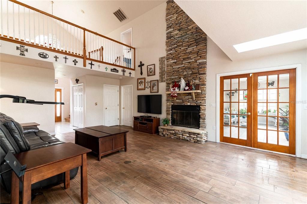 Living room with view of Sunroom