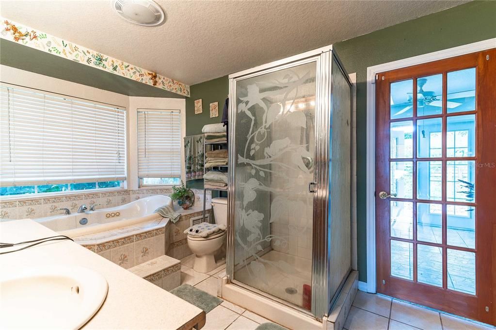 Primary bath with access to sunroom