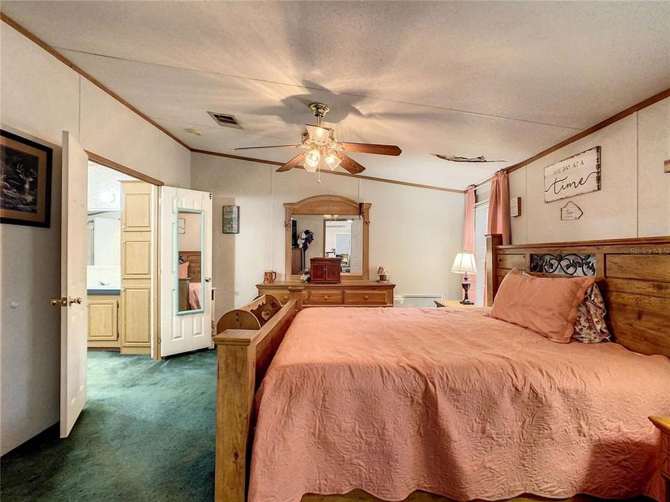 Spacious Master Bedroom with double doors to bathroom