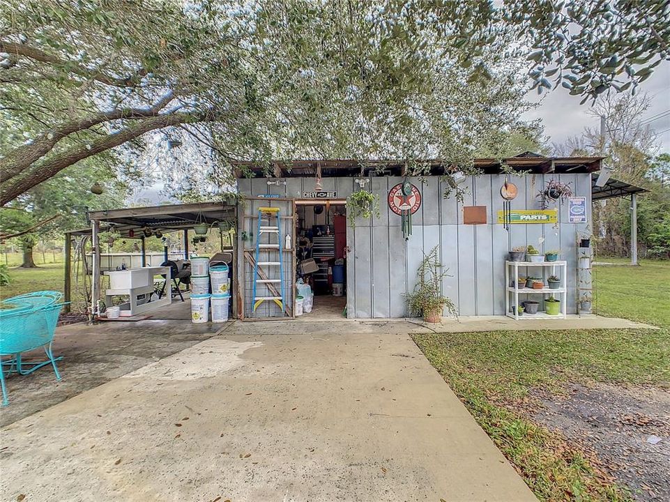 BBQ and workshop behind home.