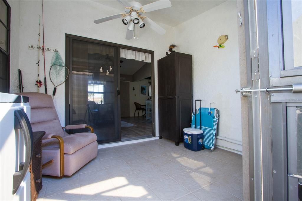 Lanai is spacious and leads to outdoor patio and storage closet