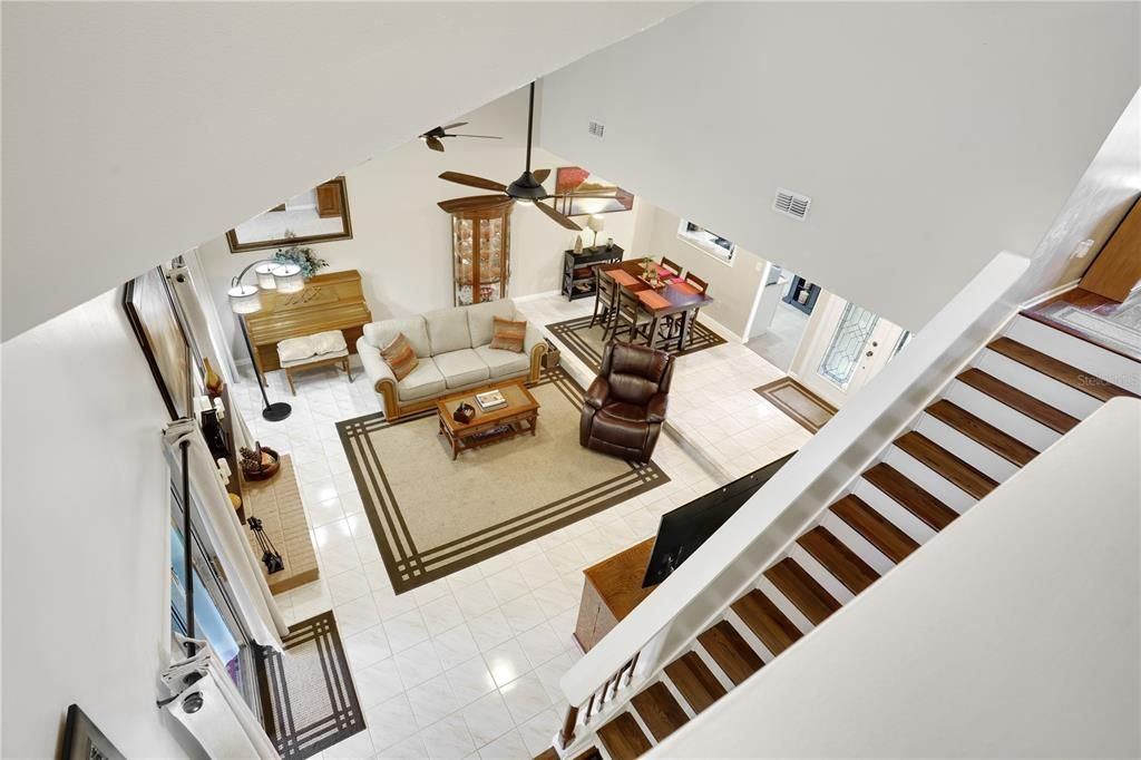VIEW OF LIVING ROOM FROM STAIRS