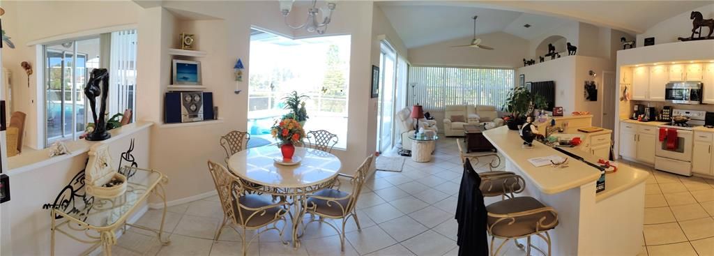 panoramic view on Dinette, open kitchen and family room