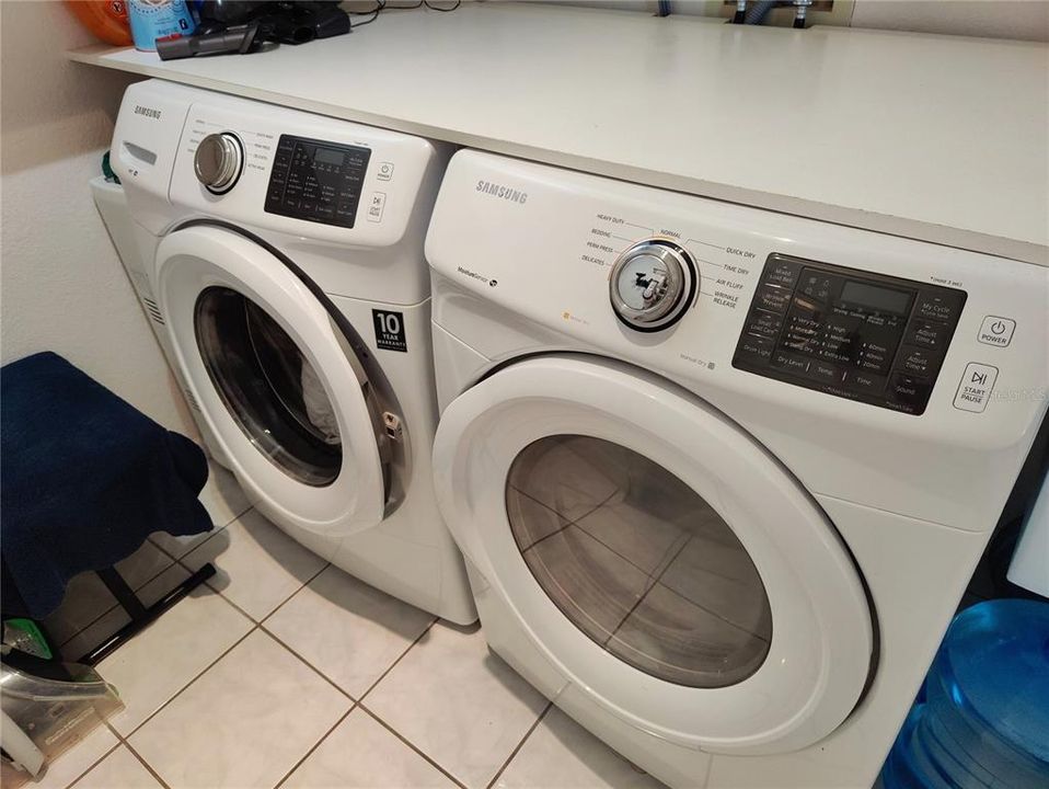 great washer and dryer, up folding table, this room has been also retiled.