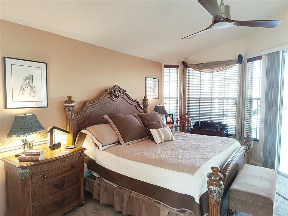 this is a huge master bedroom, with wide opening on the pool area, windows treatment luxurious, furniture are optional, offer for furniture must be separated and will not influence purchase price