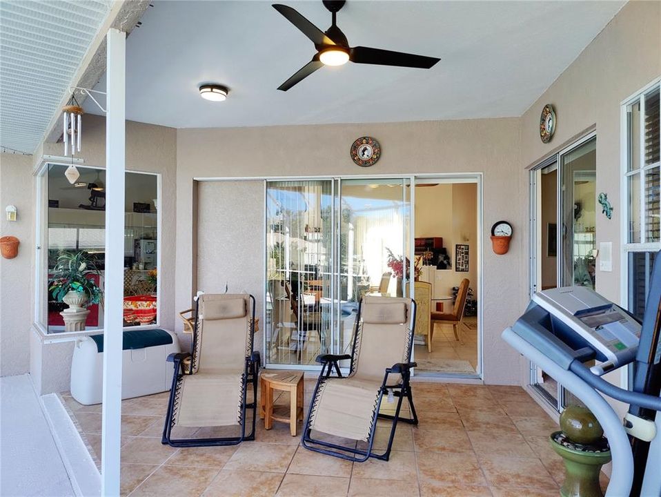 the lanai has high ceiling, new fan with remote control, pocket door to the dining area