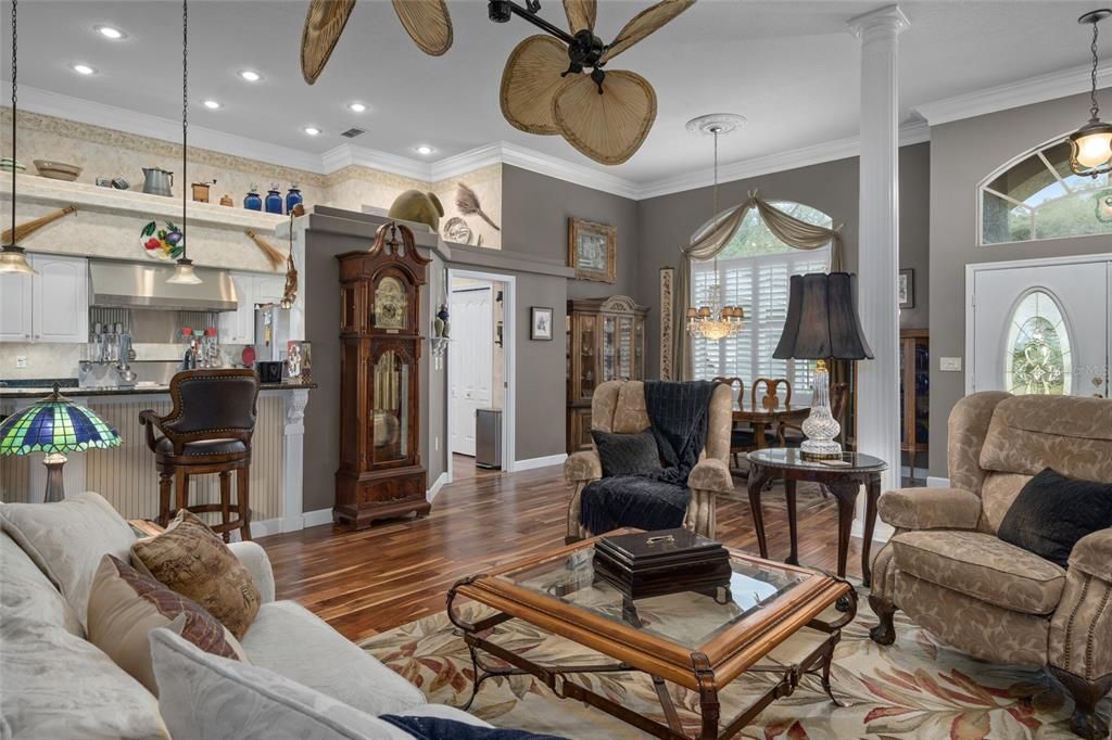 Living room towards butlers' pantry, dining area and kitchen