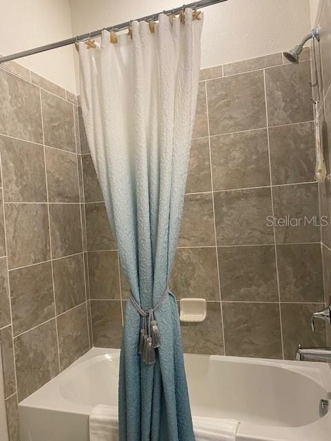 Guest bathroom tub shower combo