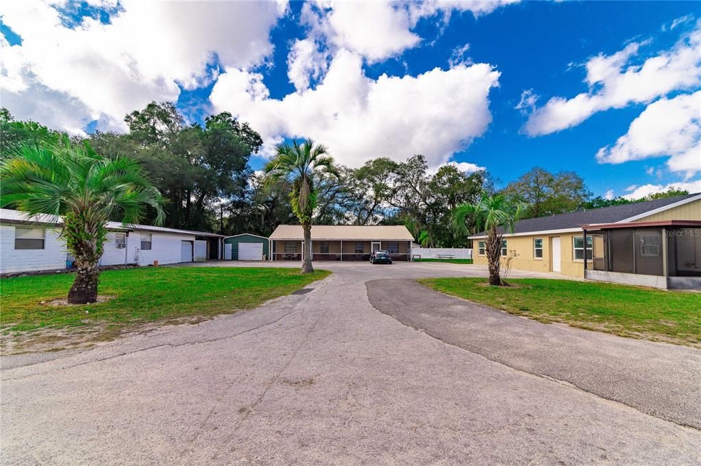 3 of the duplexes and storage sheds