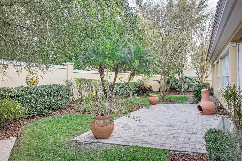 View of backyard paver patio