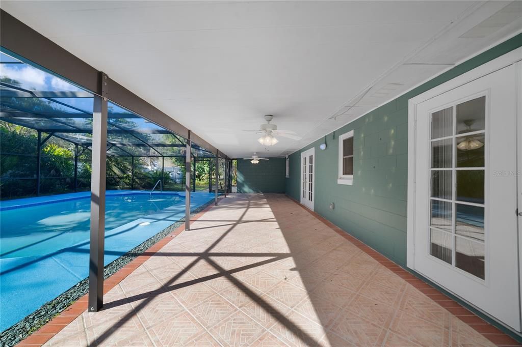 COVERED PATIO overlooks the POOL!