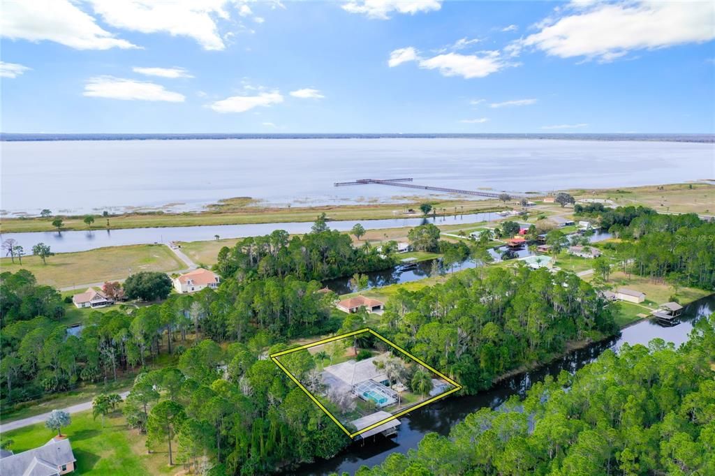 This WATERFRONT & POOL HOME has direct access to LAKE WALK-IN-WATER.  Lake Walk-In-Water is a 7500-acre  lake known for its great great bass fishing. The property line is a close approximate.