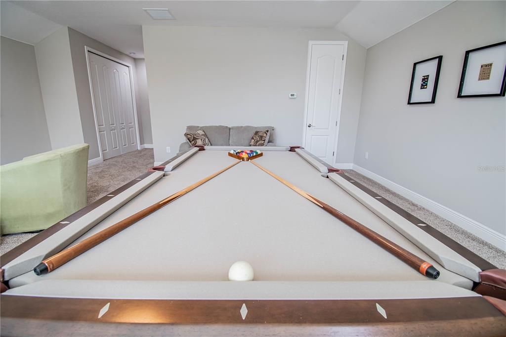 Upstairs game room/Double Master suite.