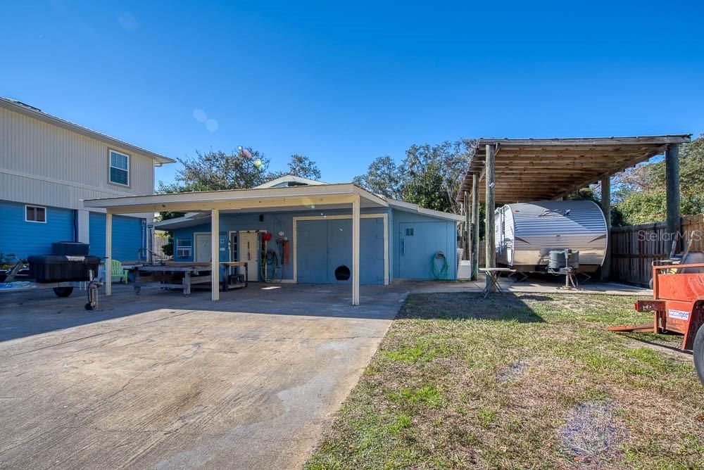 Fully functioning shop and RV Port with Barn Pole