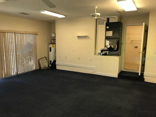 GARAGE AND DOORWAY TO UTILITY ROOM HOUSE INTERIOR