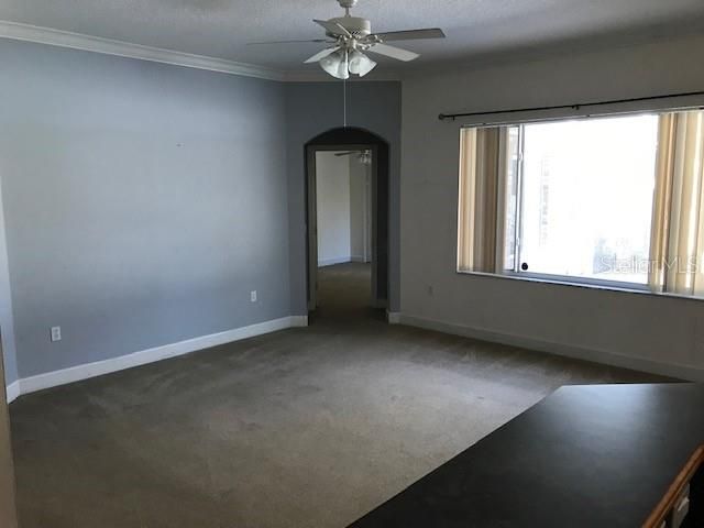 FAM RM FROM KITCHEN ISLAND, DOORWAY TO 2ND MASTER SUITE