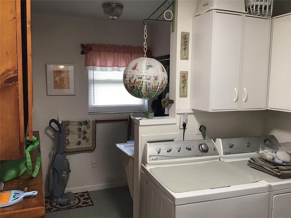 LAUNDRY ROOM WITH EXTRA STORAGE