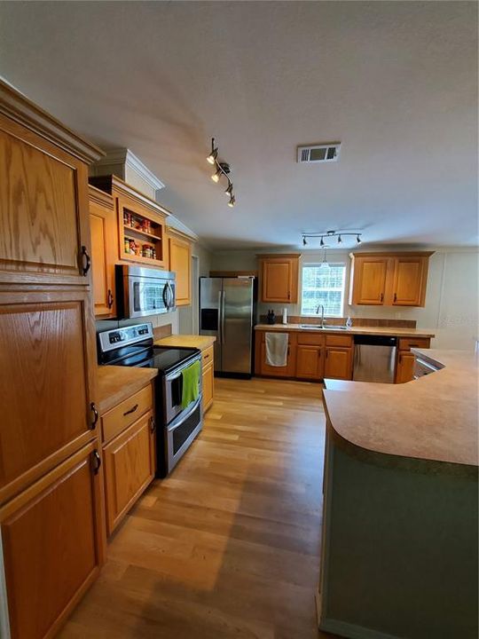 Pantry in Kitchen along with double oven