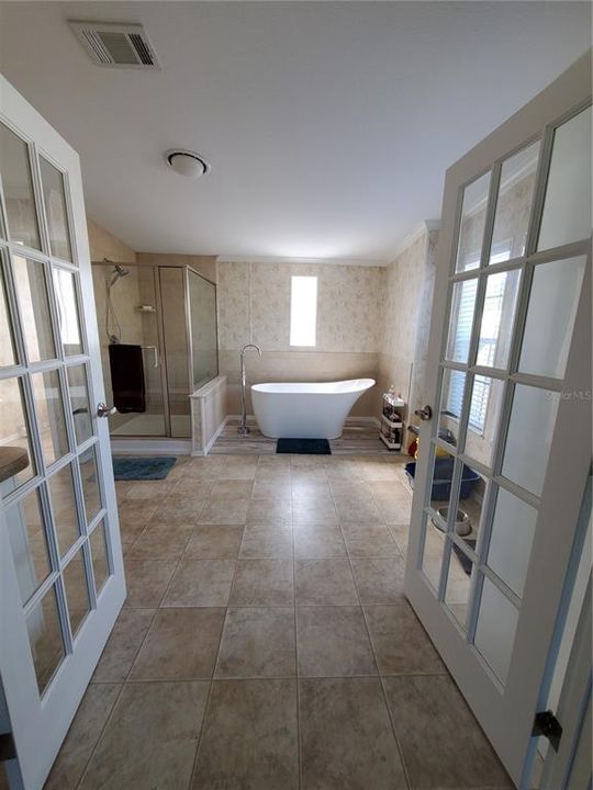 Entrance into your Master Bath w/free standing tub
