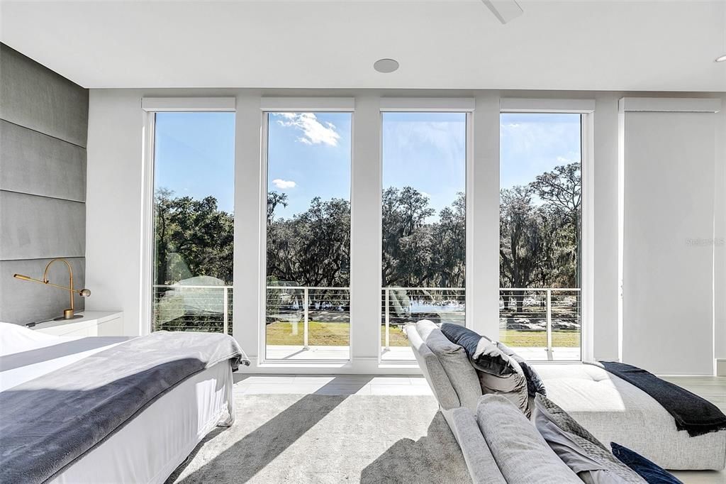 Master Suite with sitting room and retractable shades.