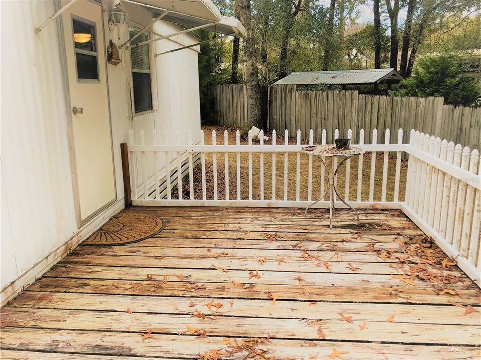 DECK TO FRONT DOOR UNDER AWNING