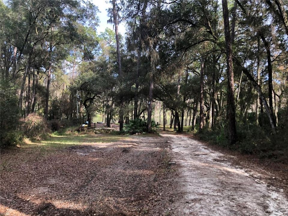 PRIVATE  COMMUNITY PARK DRIVEWAY PARKING TO THE LEFT