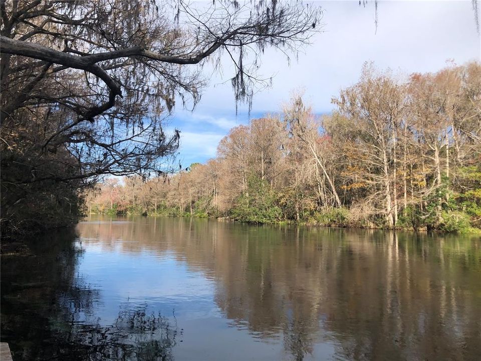 CRYSTAL CLEAR RAINBOW RIVER LOOKING FROM DOCK TO NORTH