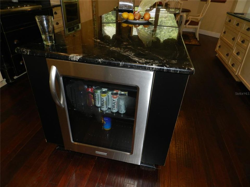 Mini refrigerator/Wine in kitchen main house.