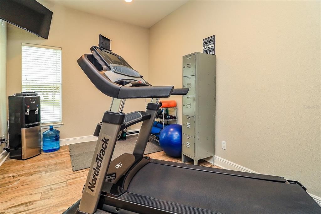 exercise room with full bath attached