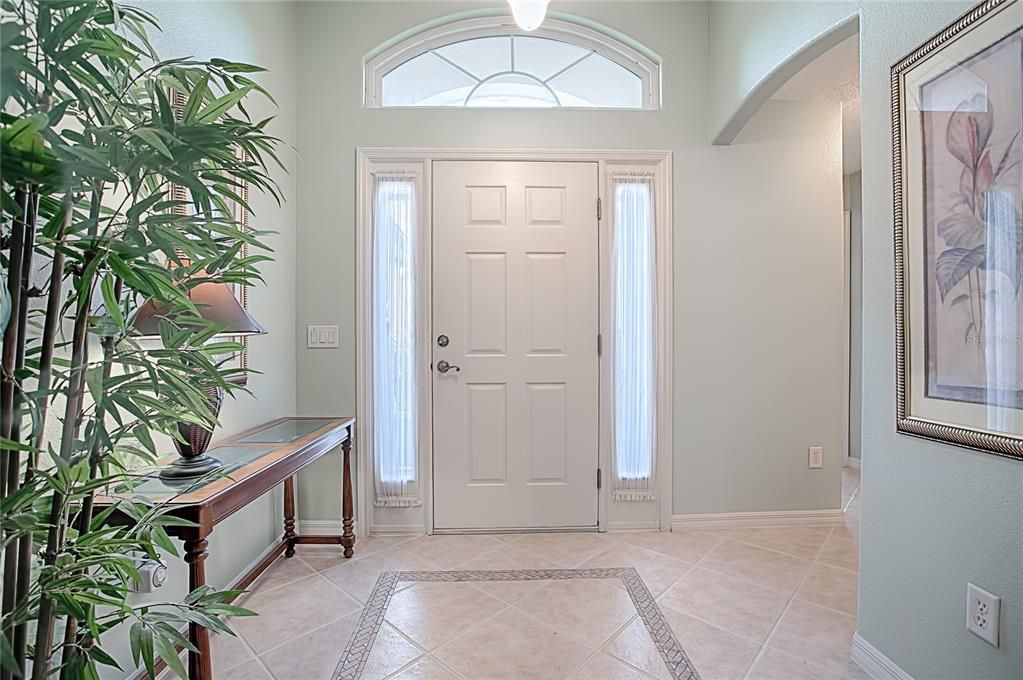 Enter your large Foyer area that greets you with diagonal tile.