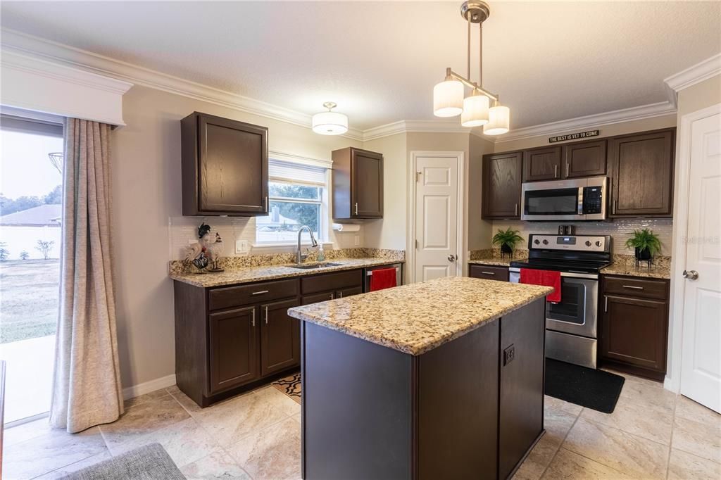 VIEW OF KITCHEN FROM FAMILY ROOM