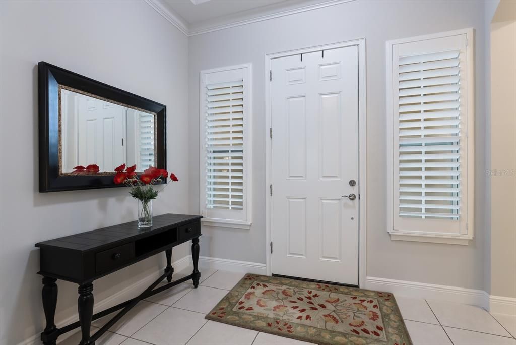 FOYERS WITH DOUBLE WINDOWS AND PLANTATION SHUTTERS