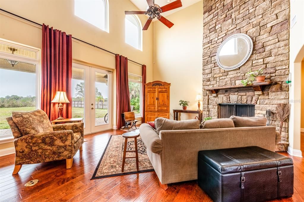 The family room has a wall of windows let the NATURAL LIGHT pour into the space!