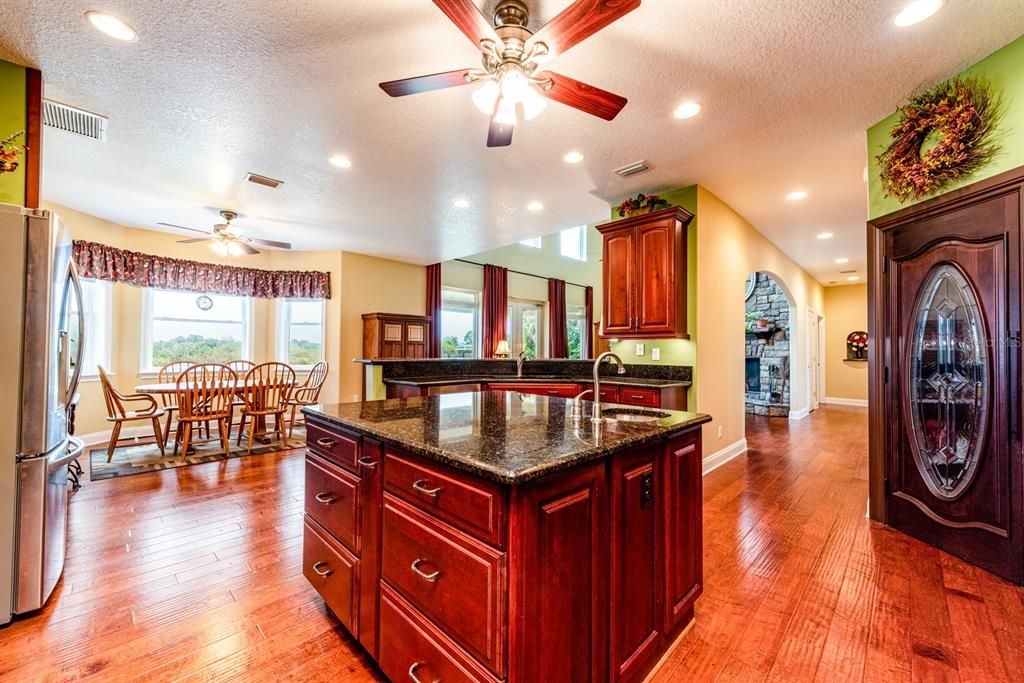 Large ISLAND for additional prep and a WALK-IN PANTRY with a beautiful leaded glass door for even more storage!