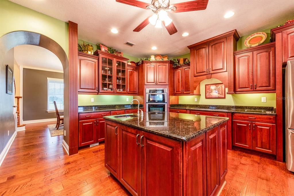 Endless cabinets and GRANITE COUNTERS including an ISLAND with a PREP SINK!