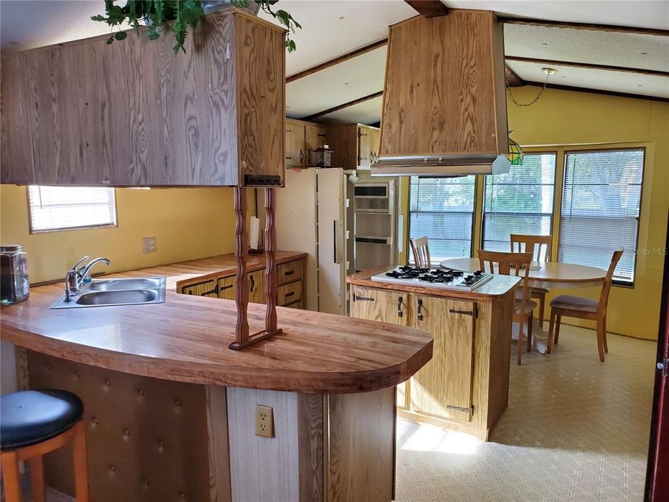 View of kitchen and breakfast bar.
