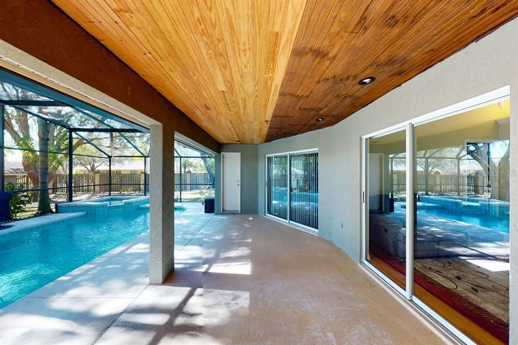 Pool & Outside Living Area with Tongue & Groove Ceiling and Recessed Lighting