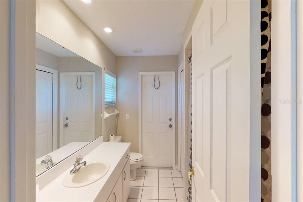 2nd Master Bathroom with Door leading to Pool Area