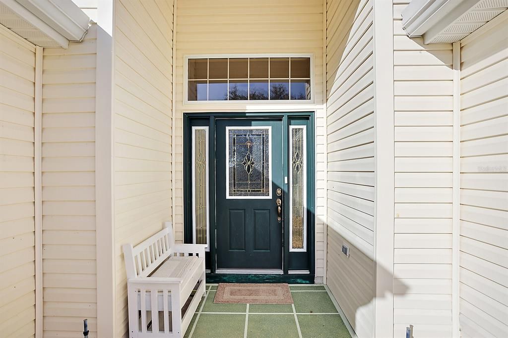 Covered Front Entrance with Elegant Leaded Glass Door
