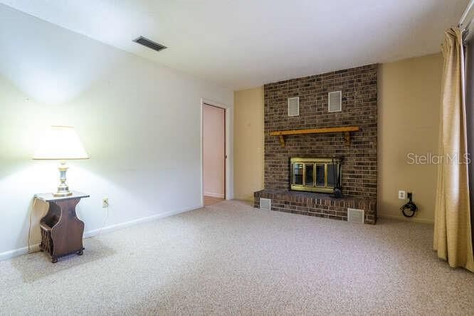 living room with fireplace view