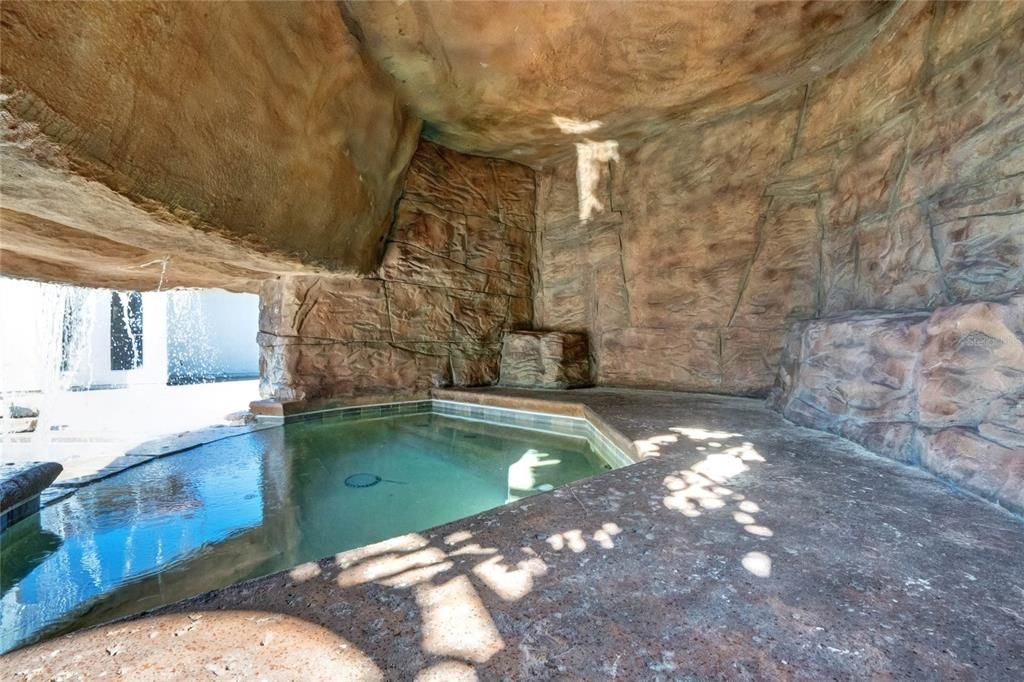 Grotto behind waterfall