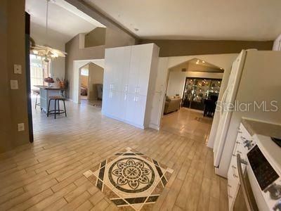 Kitchen looking into Living room & Dining Room